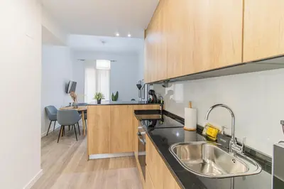 Una cocina o zona de cocina en Your luxury getaway in downtown Zaragoza