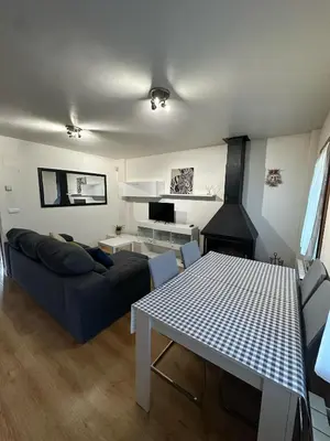 Una televisión o centro de entretenimiento en Apartamento La brisa Fiscal
