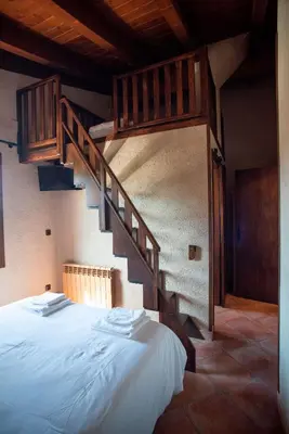 Cama o camas de una habitación en L'Olivera - BENABARRE