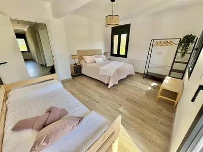 Cama o camas de una habitación en Casa Cal Canó