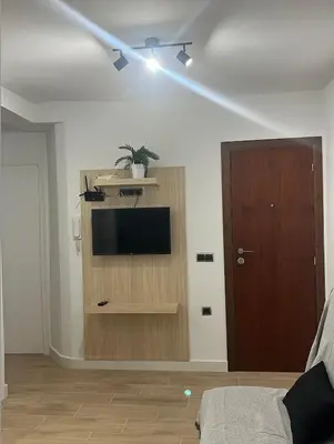 Una televisión o centro de entretenimiento en Apartamentos Rurales Miguela