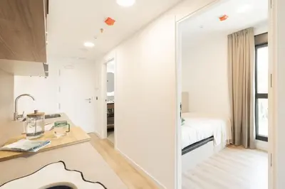 Cama o camas de una habitación en Canvas Pamplona Plazaola
