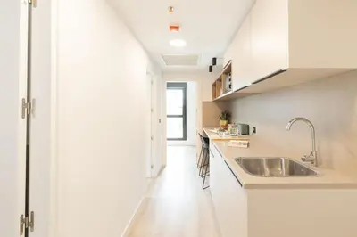 Una cocina o zona de cocina en Canvas Pamplona Plazaola