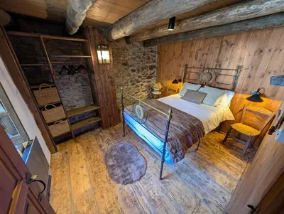 Cama o camas de una habitación en Casa Rústica y Chic con Chimenea y Vistas Panorámicas de La Vall de Boí