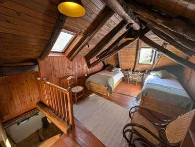 Cama o camas de una habitación en Casa Rústica y Chic con Chimenea y Vistas Panorámicas de La Vall de Boí