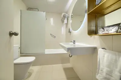 Un baño de Hotel Luze El Villa