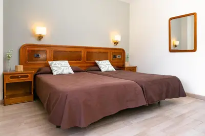 Cama o camas de una habitación en Hotel SNÖ Condes del Pallars