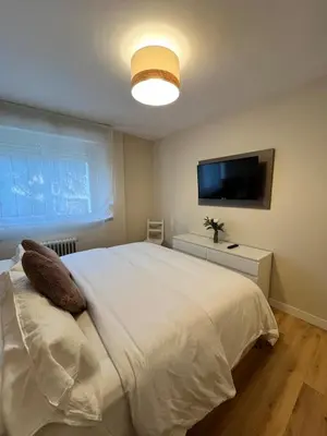 Cama o camas de una habitación en Casa Elso Pamplona