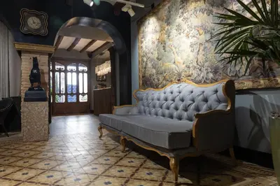 Zona de estar de 5 Sentidos - Suites de Lujo