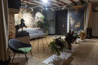 Zona de estar de 5 Sentidos - Suites de Lujo