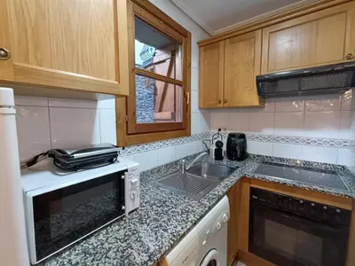 Una cocina o zona de cocina en Apartamento Oreja de Oso Benasque Inmocyma