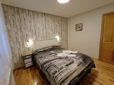 Cama o camas de una habitación en Apartamento Oreja de Oso Benasque Inmocyma