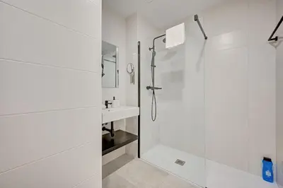 Un baño de Apartamento MYE 2 by Clabao