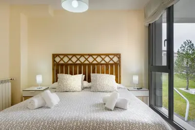 Cama o camas de una habitación en Duplex Las Margas Vistas Montañas