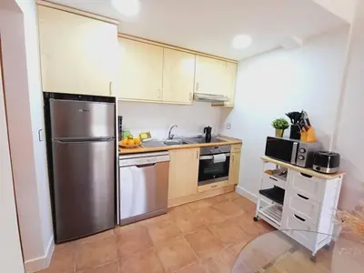 Una cocina o zona de cocina en La Terraza de Escarrilla, con piscina
