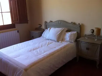 Cama o camas de una habitación en Mas Perdiueta