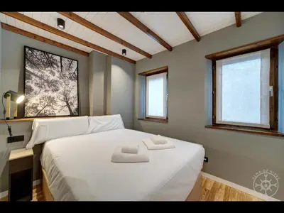 Cama o camas de una habitación en CAP D'ARAN de Alma de Nieve