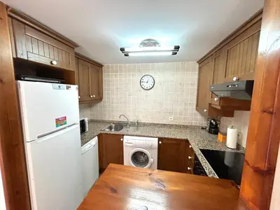 Una cocina o zona de cocina en Apartament lluminós de muntanya by RURAL D'ÀNEU