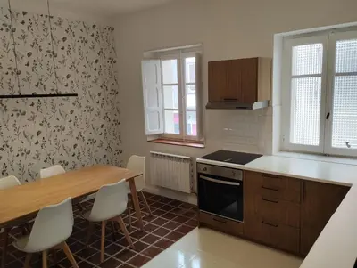 Una cocina o zona de cocina en Amplio piso en casa histórica en primera planta