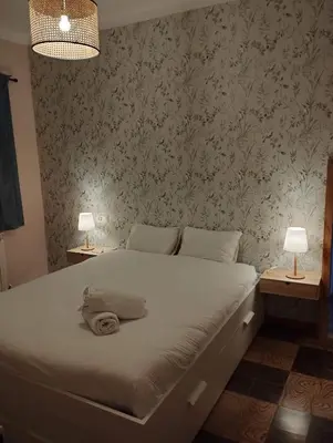 Cama o camas de una habitación en Amplio piso en casa histórica en primera planta