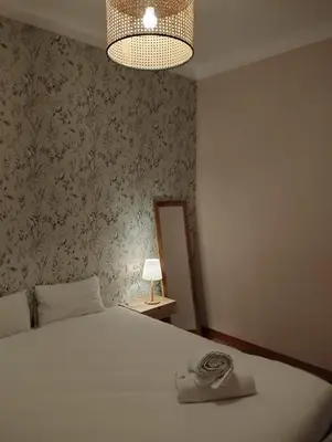 Cama o camas de una habitación en Amplio y céntrico piso a pie de calle