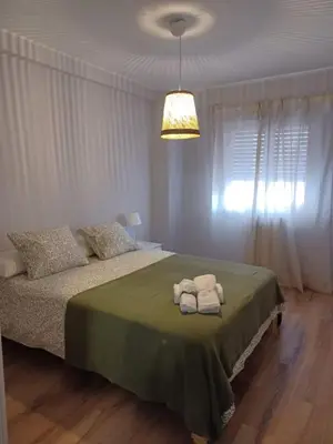 Cama o camas de una habitación en Quiet apartment near the Pilar