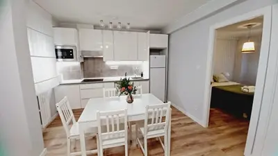 Una cocina o zona de cocina en Quiet apartment near the Pilar