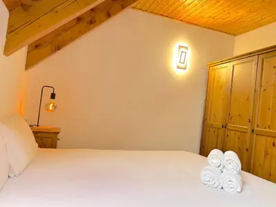 Cama o camas de una habitación en Dúplex acollidor i rústic a Espot by RURAL D'ÀNEU