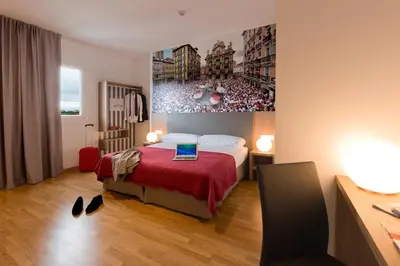 Cama o camas de una habitación en IRAIPE Pamplona Hostal Auto Check-in