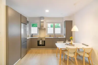 Una cocina o zona de cocina en Gran apartamento tipo loft a 15 minutos del centro