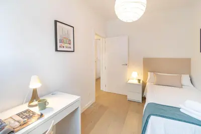 Cama o camas de una habitación en Gran apartamento tipo loft a 15 minutos del centro