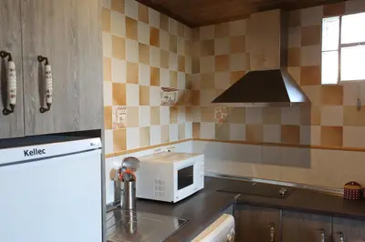 Una cocina o zona de cocina en Casa Rural La Tejada