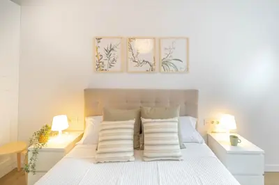 Cama o camas de una habitación en Acogedor Loft a 15 minutos del centro de Pamplona