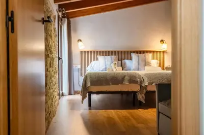 Cama o camas de una habitación en La Caseta de Freixenet Encanto rural y natural