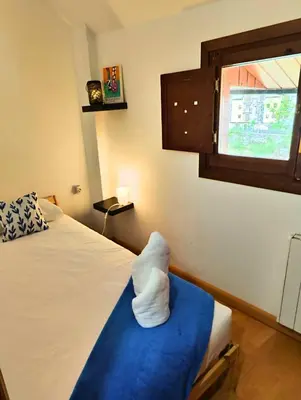 Cama o camas de una habitación en Apartamento Sobremonte: vistas al Rio Gallego