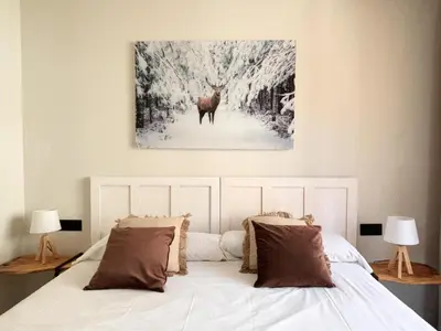 Cama o camas de una habitación en Villa Aneto - Confort moderno en el corazón de Benasque