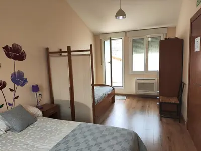 Cama o camas de una habitación en El Sendero