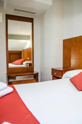 Cama o camas de una habitación en Hotel Jaqués