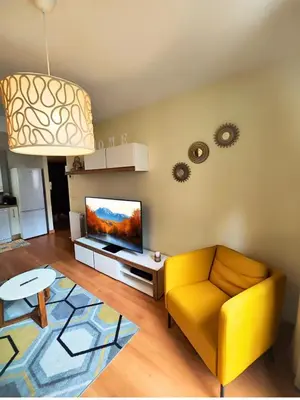 Una televisión o centro de entretenimiento en Apartamento Punta Escarra