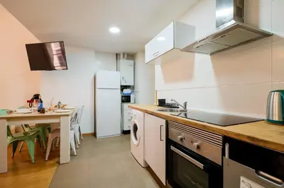 Una cocina o zona de cocina en Suite Seo | Centro 8 Pax Familiar | 3 Dormitorios