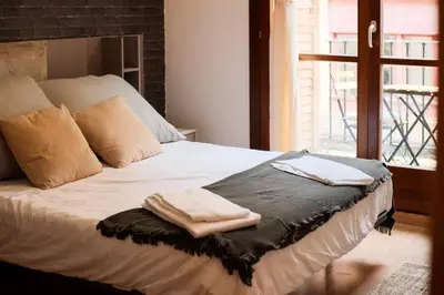 Cama o camas de una habitación en Suite Seo | Centro 8 Pax Familiar | 3 Dormitorios