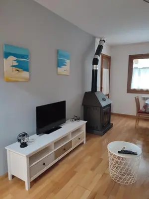 Una televisión o centro de entretenimiento en Apartamento Chispita