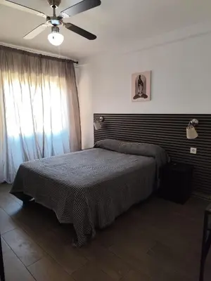 Cama o camas de una habitación en Hostal Castilla