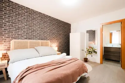 Cama o camas de una habitación en Casa Augusta | Renovada | Centro Histórico | 5 Pax