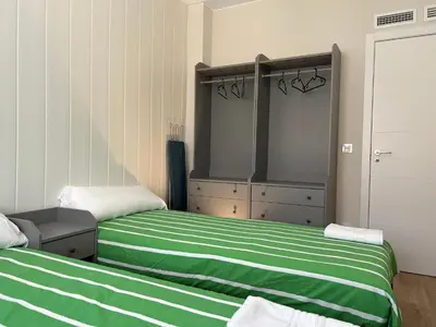 Cama o camas de una habitación en Aparts Zentrum Barrioverde