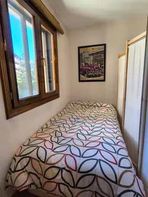 Cama o camas de una habitación en Ibón de Piniecho