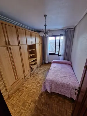 Cama o camas de una habitación en La casa de los famosos