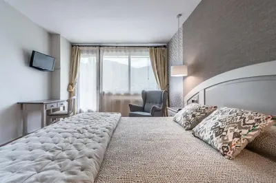 Cama o camas de una habitación en Hotel de Montaña El Mirador