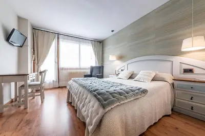 Cama o camas de una habitación en Hotel de Montaña El Mirador