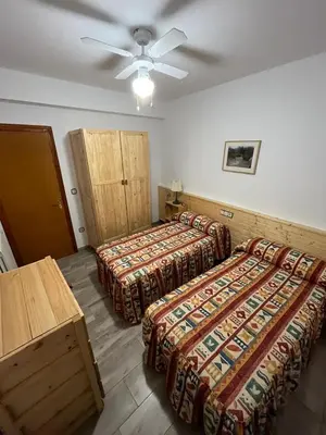 Cama o camas de una habitación en Castelserás apartamento rural